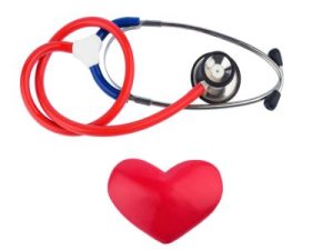 Stethoskop und ein Herz, Symbolfoto für Herz-Kreislauf-Risiko und Herzinfarkt